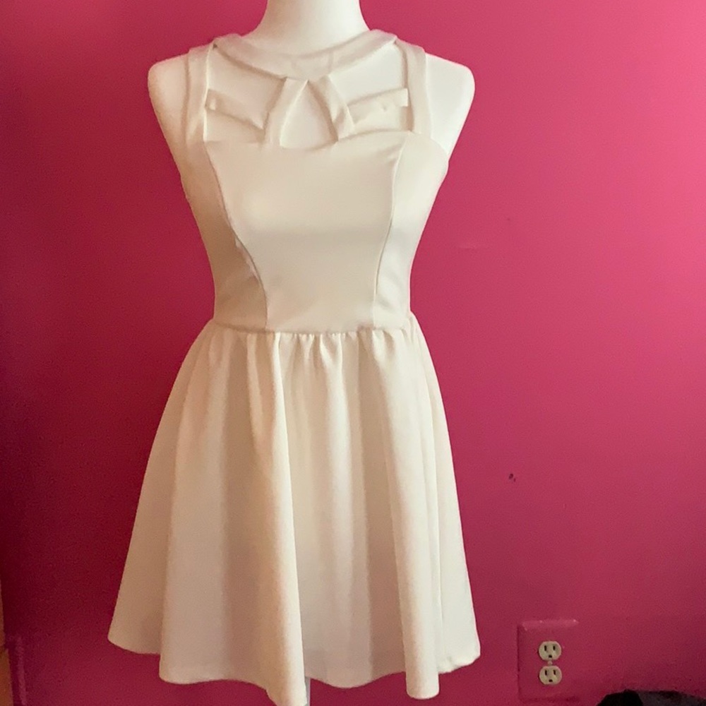 Cream party dress with cut-outs